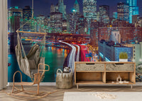 Manhattan skyline at night with blueish tones.

