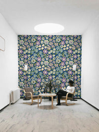 Flowers in blush pink, pale cream/off-white, light blue-grey, and pale yellow-green.

