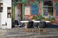 Features a quaint and inviting cafe storefront or exterior.
