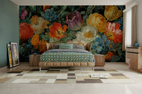 The background is dark, providing a dramatic contrast that makes the colors of the flowers pop.
