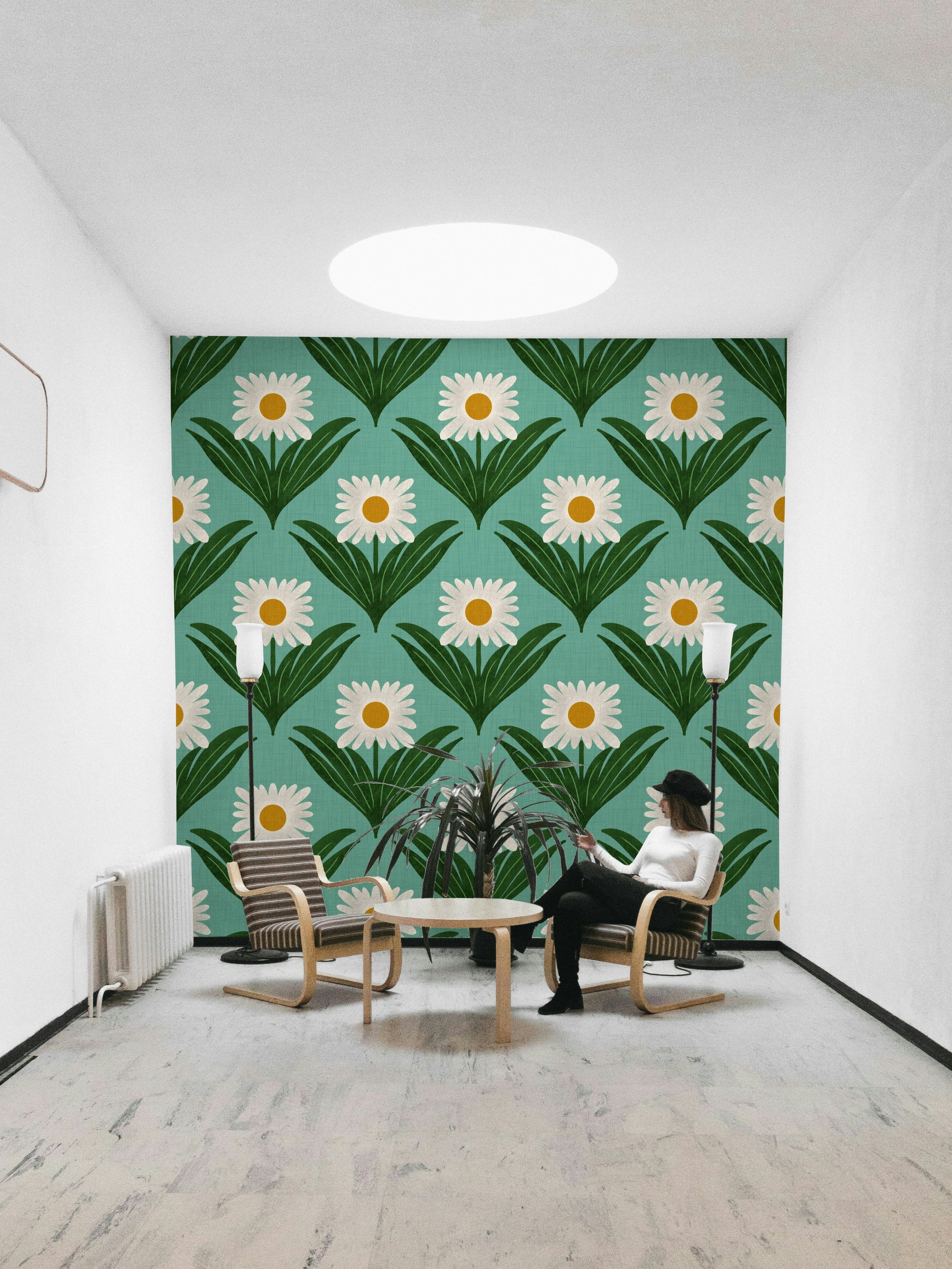 Features large, stylized daisy flowers and other mod florals.
