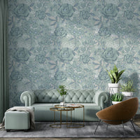 Wallpaper with a pattern of flowers and leaves.

