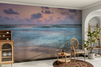 A wall mural of a long-exposure photograph of a rough sea.

