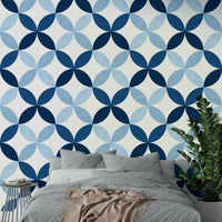 The room feels sophisticated and luxurious due to the deep color.

