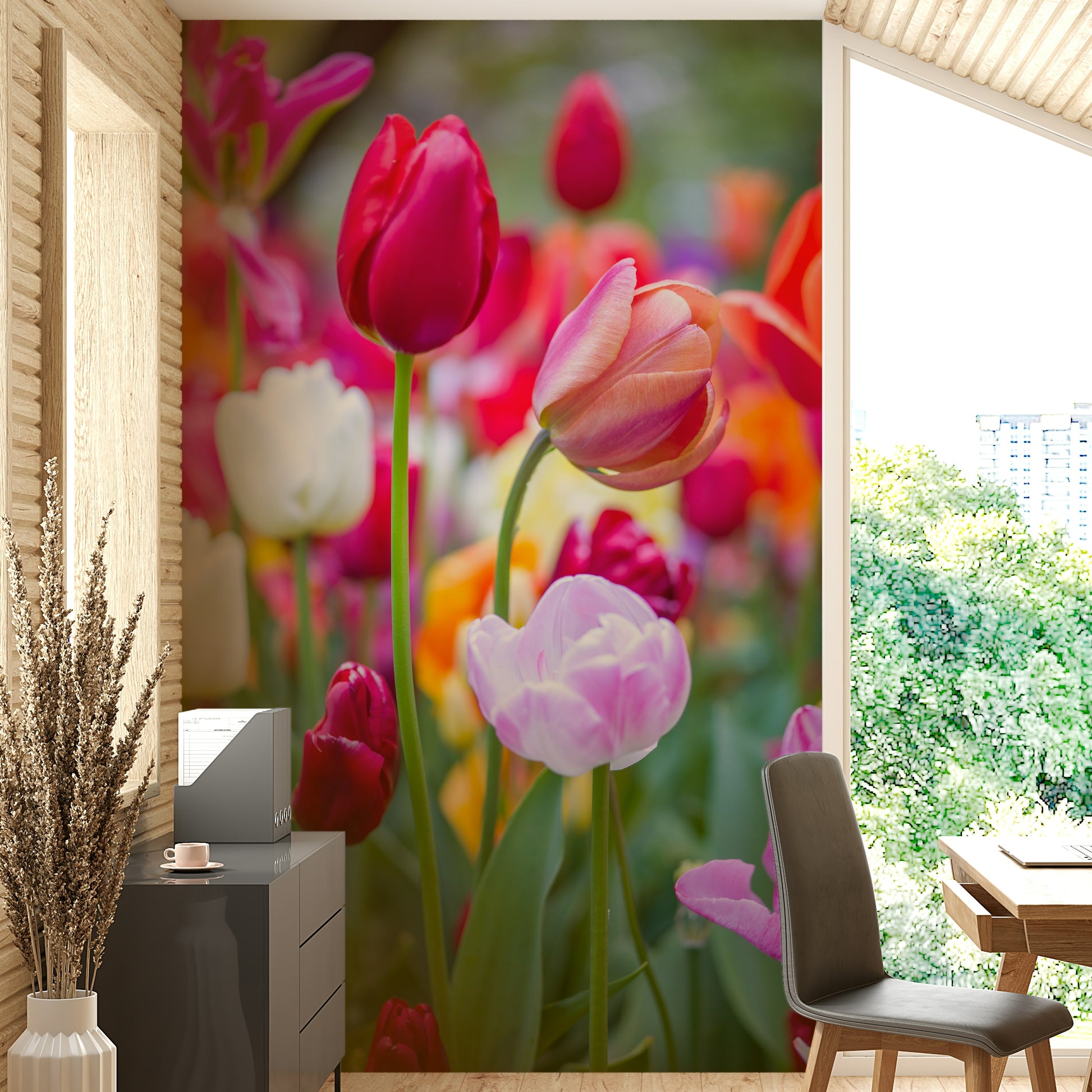 The foreground features several tulips in crisp focus, while the background is a soft blur of color.

