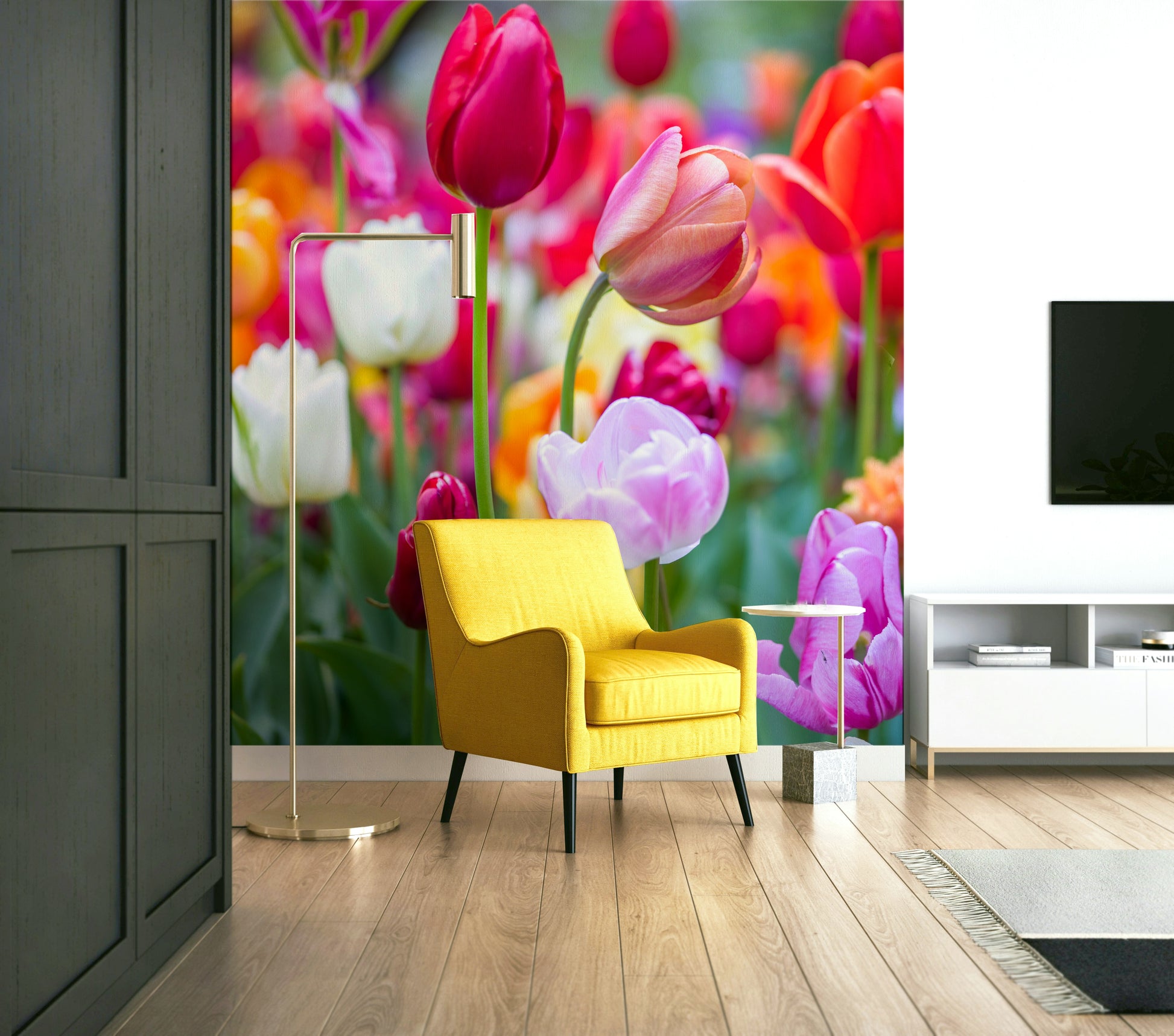 The flowers are in various bright colors, including red, pink, orange, purple, and white.

