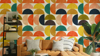 A wallpaper with a repeating semicircle pattern.


