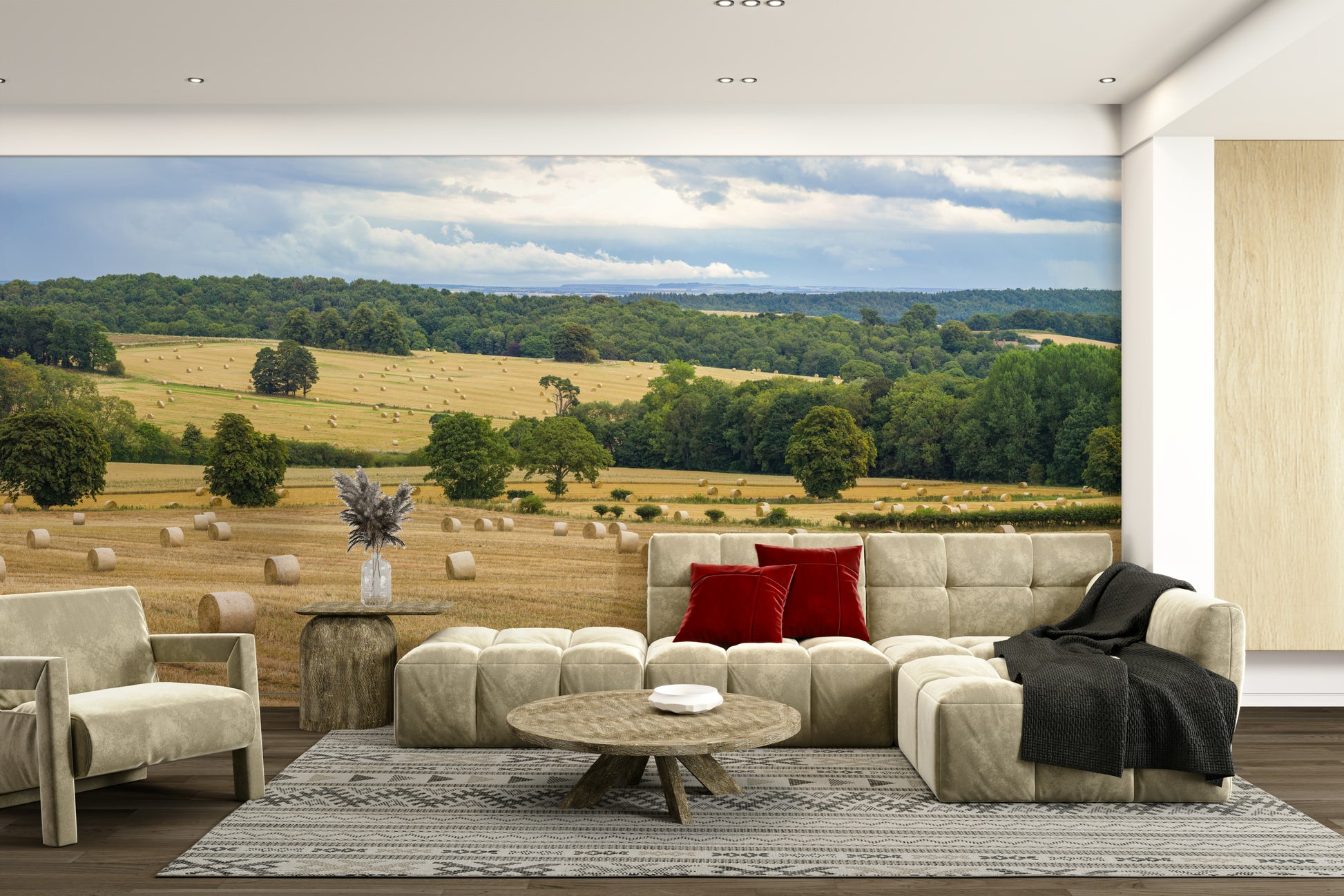 A wall mural with a panoramic view of a golden field.

