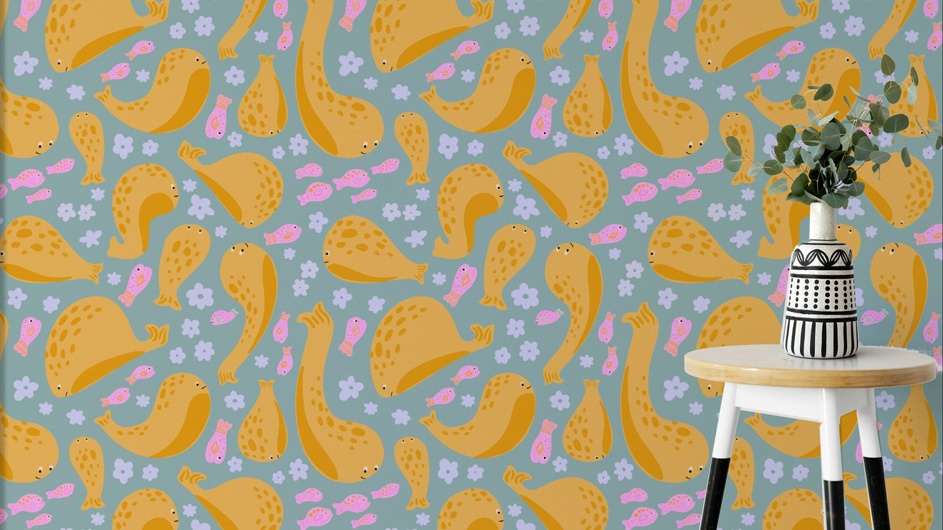 The image shows a pattern of playful whales.

