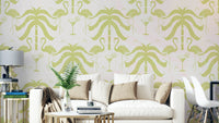 A wall mural of a tropical palm and flamingo pattern.

