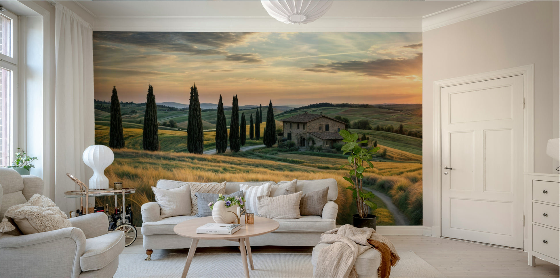 The mural gives the illusion of a window looking out onto the countryside.
