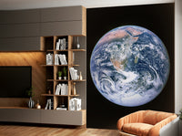 Vast blue oceans fill most of the image.
