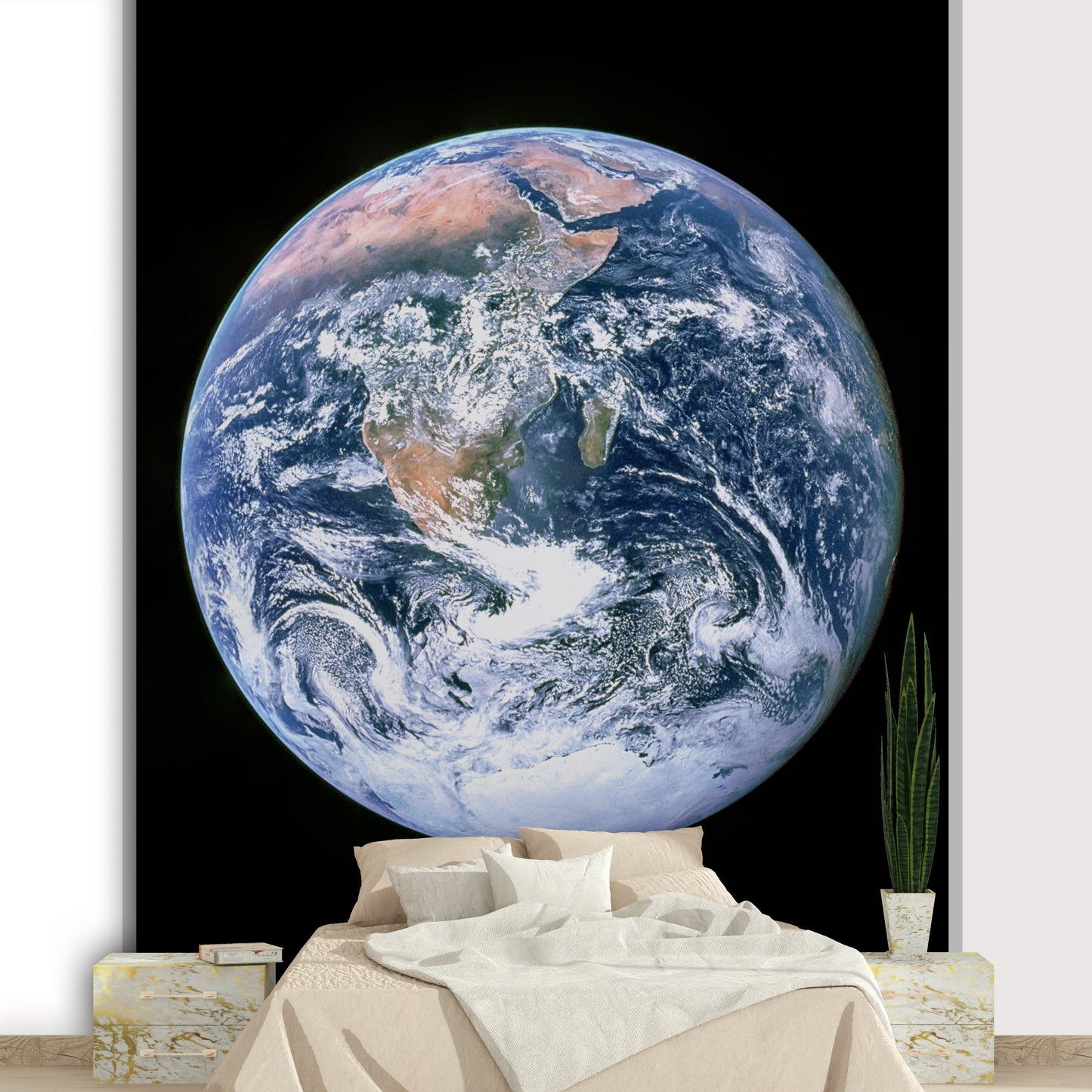 White, swirling clouds are scattered across the planet's surface.
