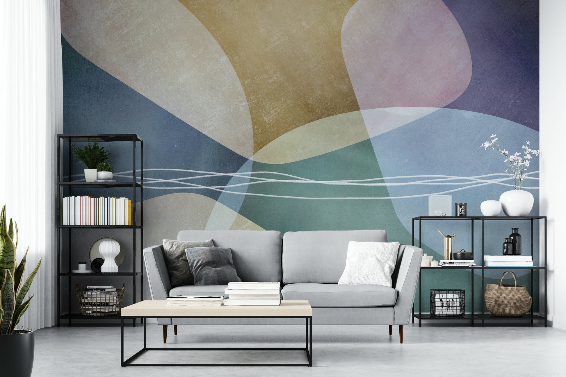 A wall mural with a geometric pattern of soft, fluid shapes.
