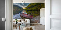 A wall mural featuring a peaceful lake scene.

