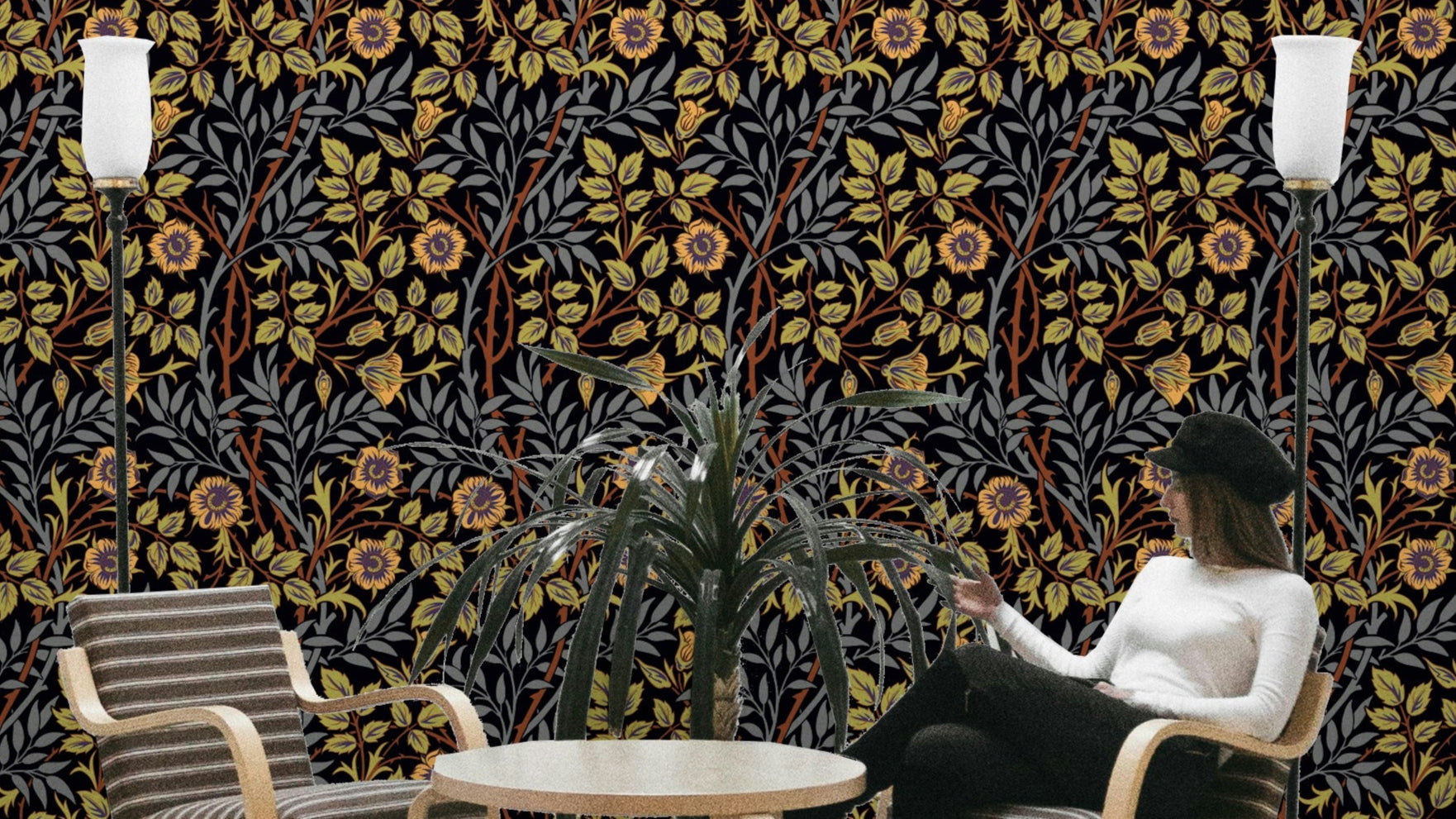 A wallpaper featuring a classic, intricate floral pattern.

