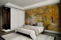 The trees are full of autumn leaves in shades of yellow and gold.

