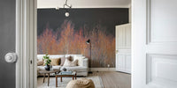 A wall mural depicting a serene forest at sunset or dusk.
