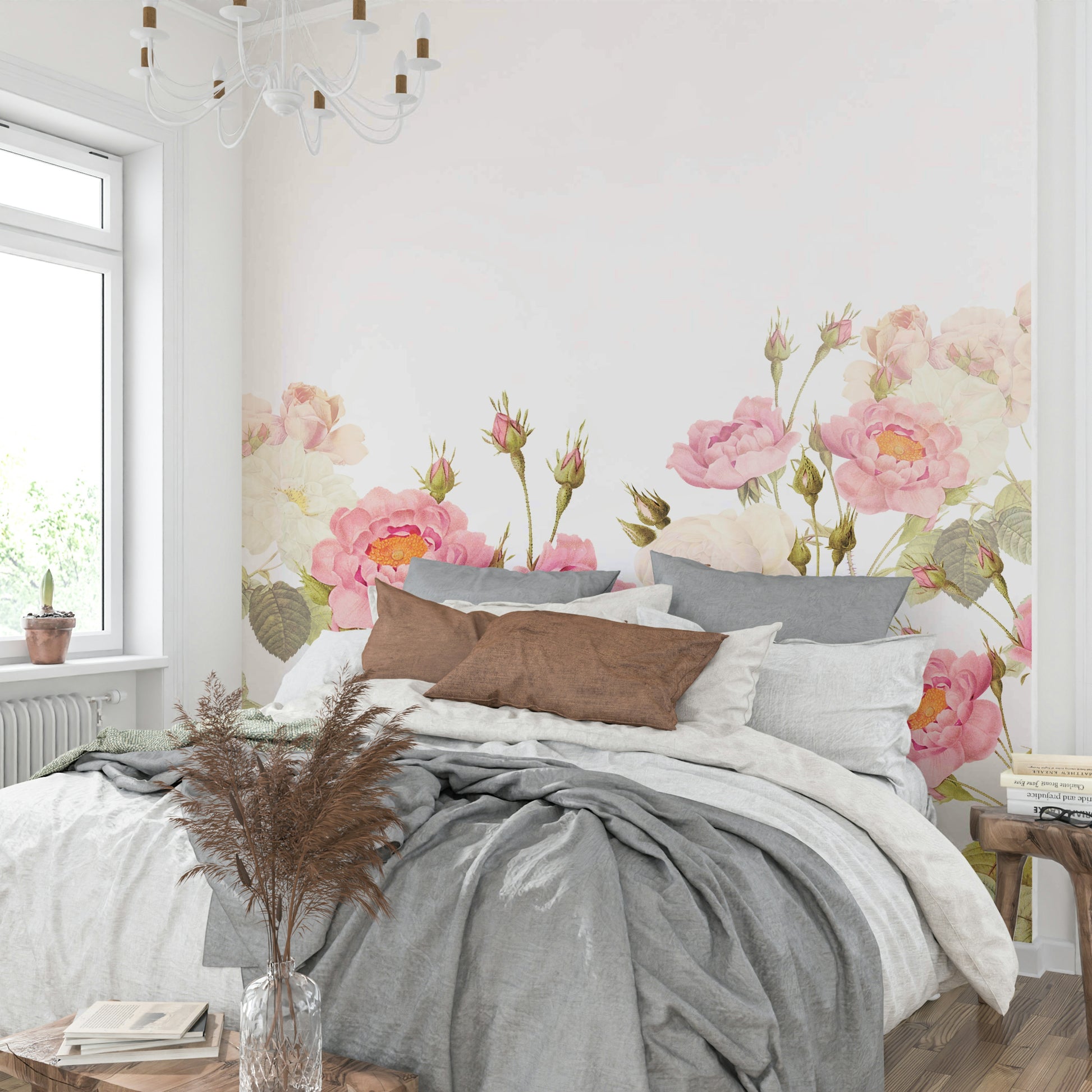 A close-up view of a wall mural featuring blush pink and cream roses.
