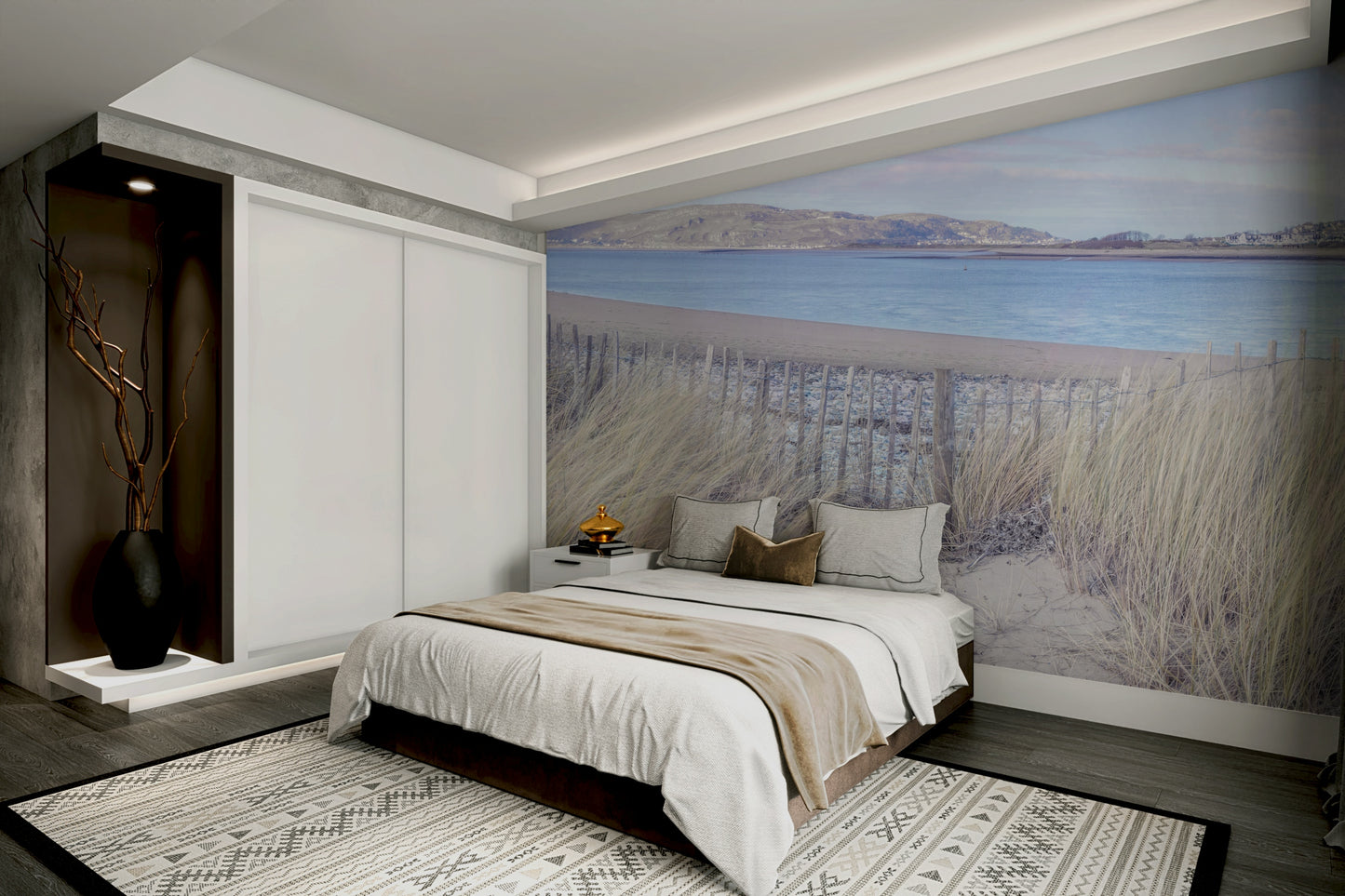 The mural shows a peaceful landscape with cliffs and a sandy beach.

