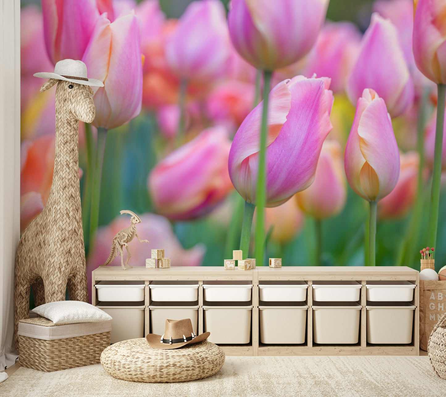 The mural shows a peaceful scene with trees, flowers, and a stream.

