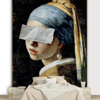 The mural shows the 'Girl with a Pearl Earring' in a disguise.


