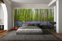 The mural shows a peaceful forest scene.

