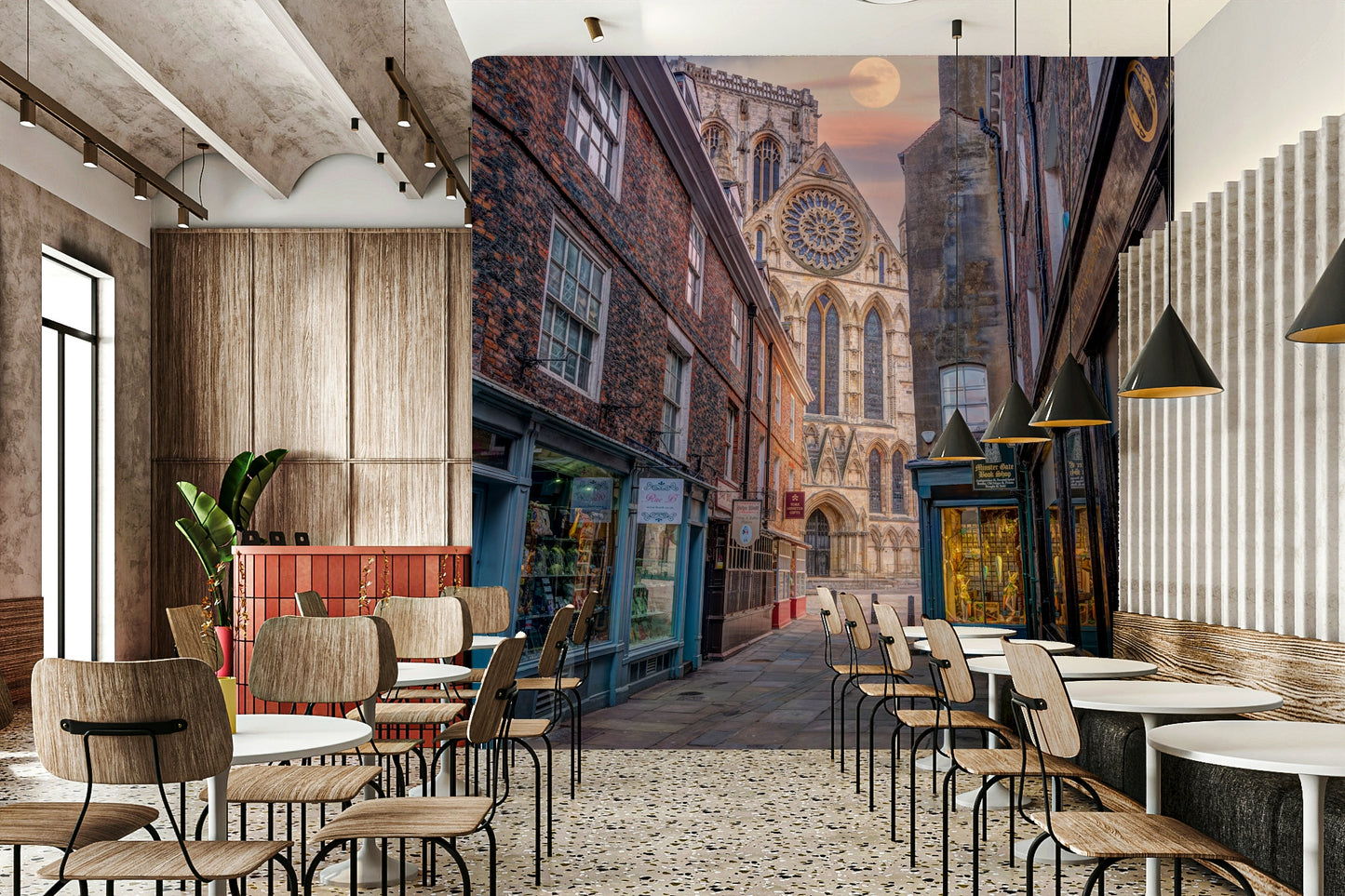 The mural shows an old European street with a cathedral.

