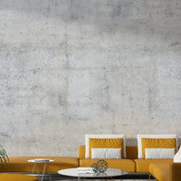 Wallpaper mural with a raw concrete texture.

