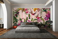 The mural gives the illusion of a window looking out onto a beautiful jungle.
