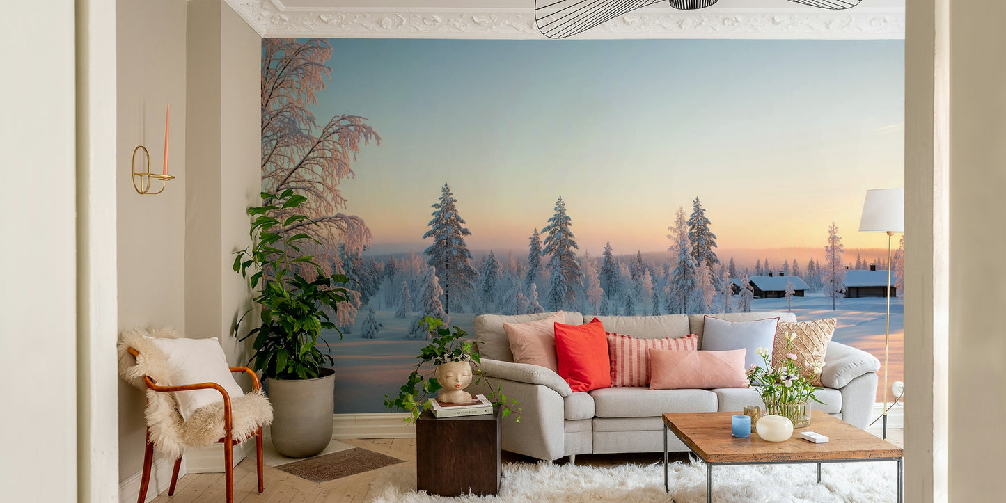 A wide shot of a wall mural showing a snowy forest at sunrise.
