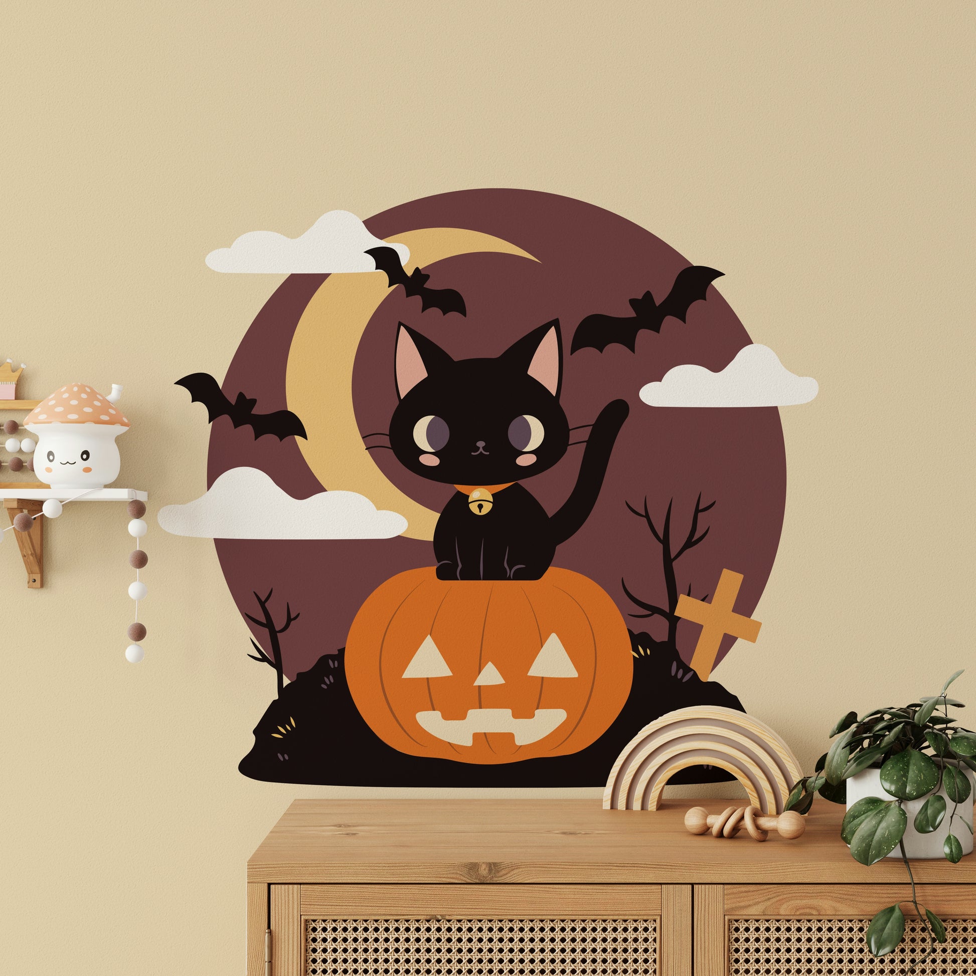 Removable pumpkin wall decor with a charming black cat illustration.
