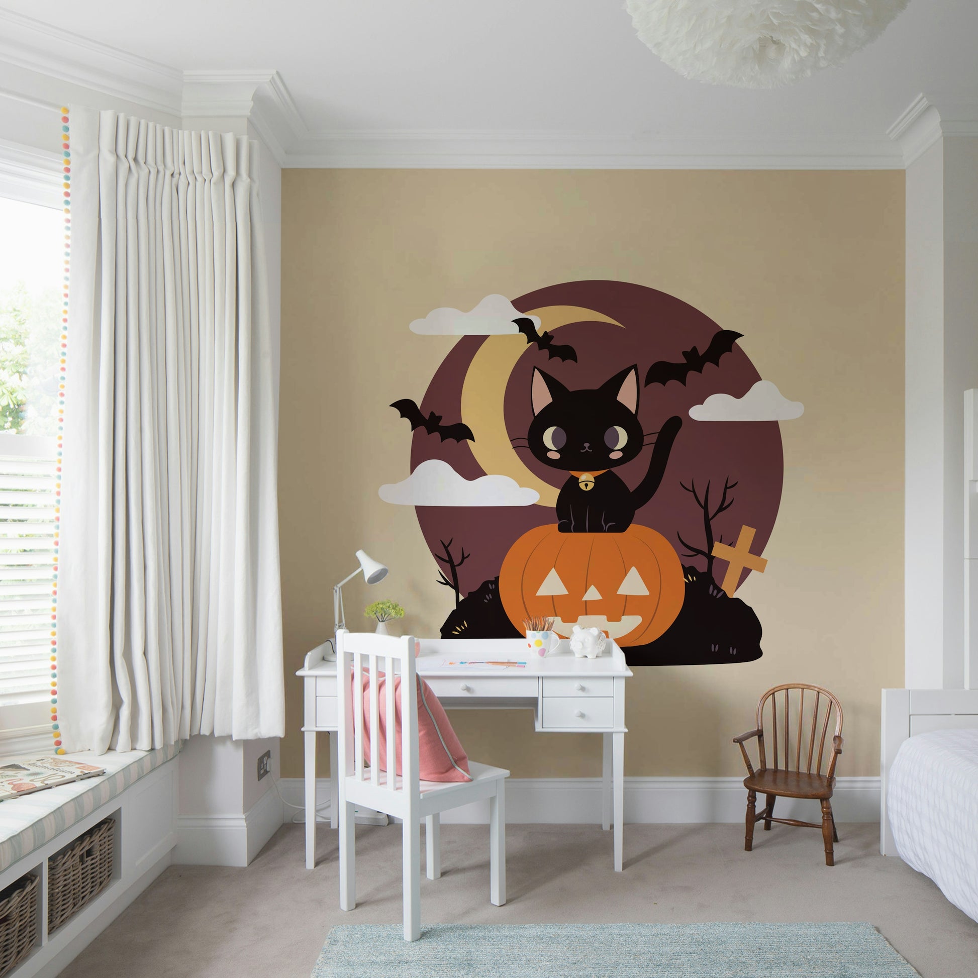 Living room wall decorated with a spooky black cat wall decor for Halloween.
