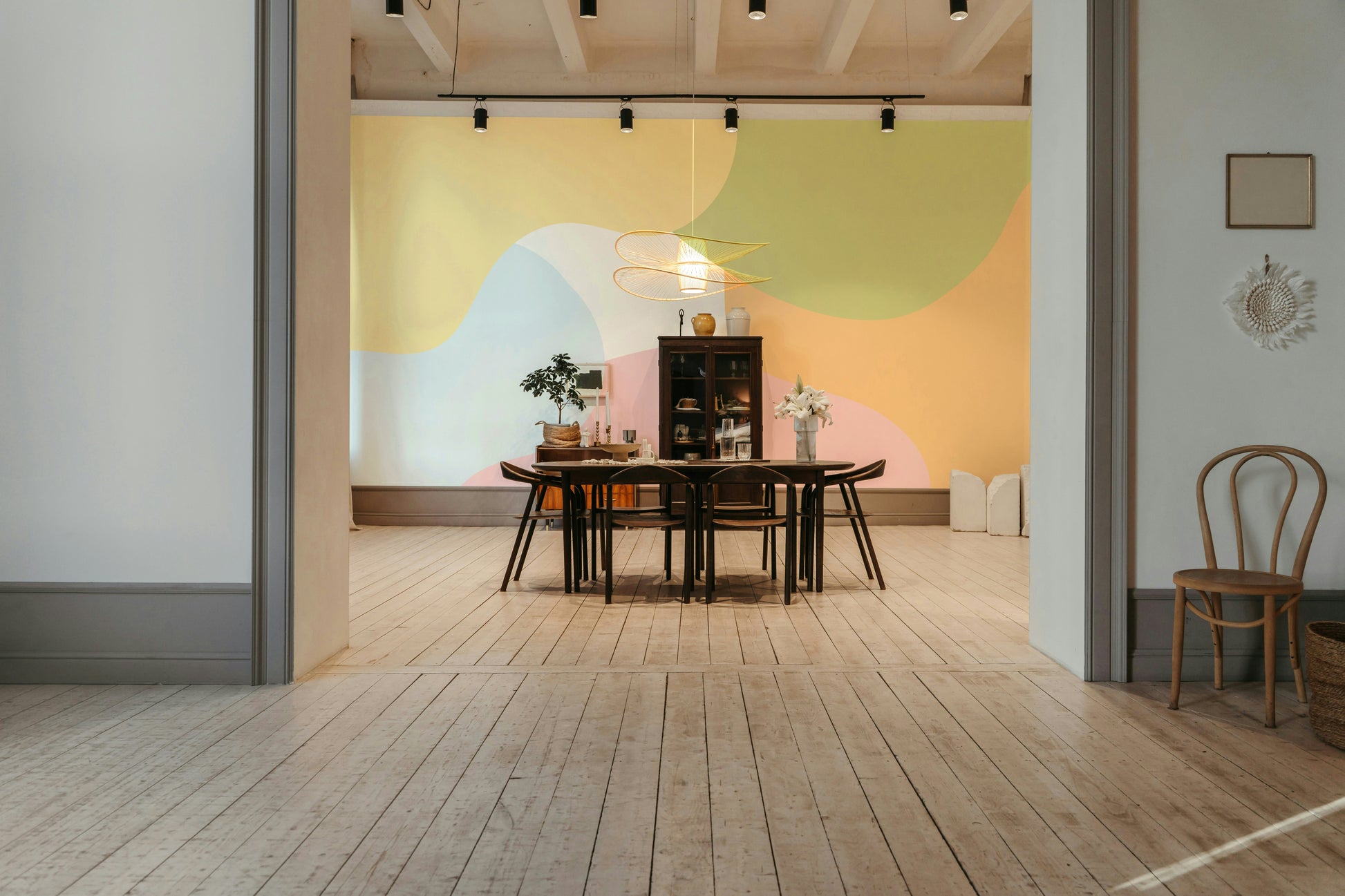 A peaceful wall mural with a soft geometric pattern.

