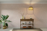 The colors are soft and gentle, with a muted, sandy beige palette.

