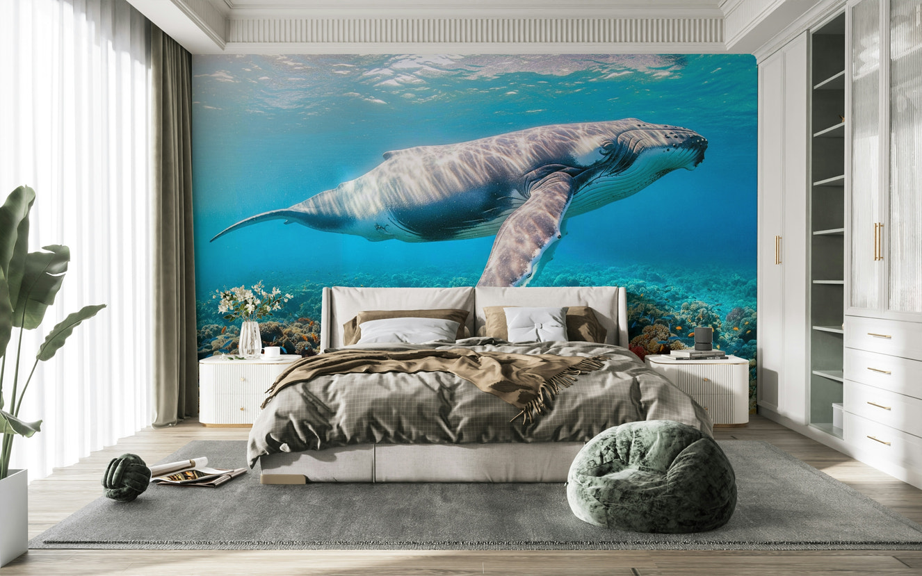 The design features a large, majestic whale swimming underwater.

