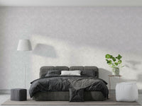 The colors are gentle and lush, with a natural, green and gray palette.

