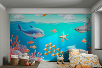 A cheerful wall mural with a whimsical, underwater design.


