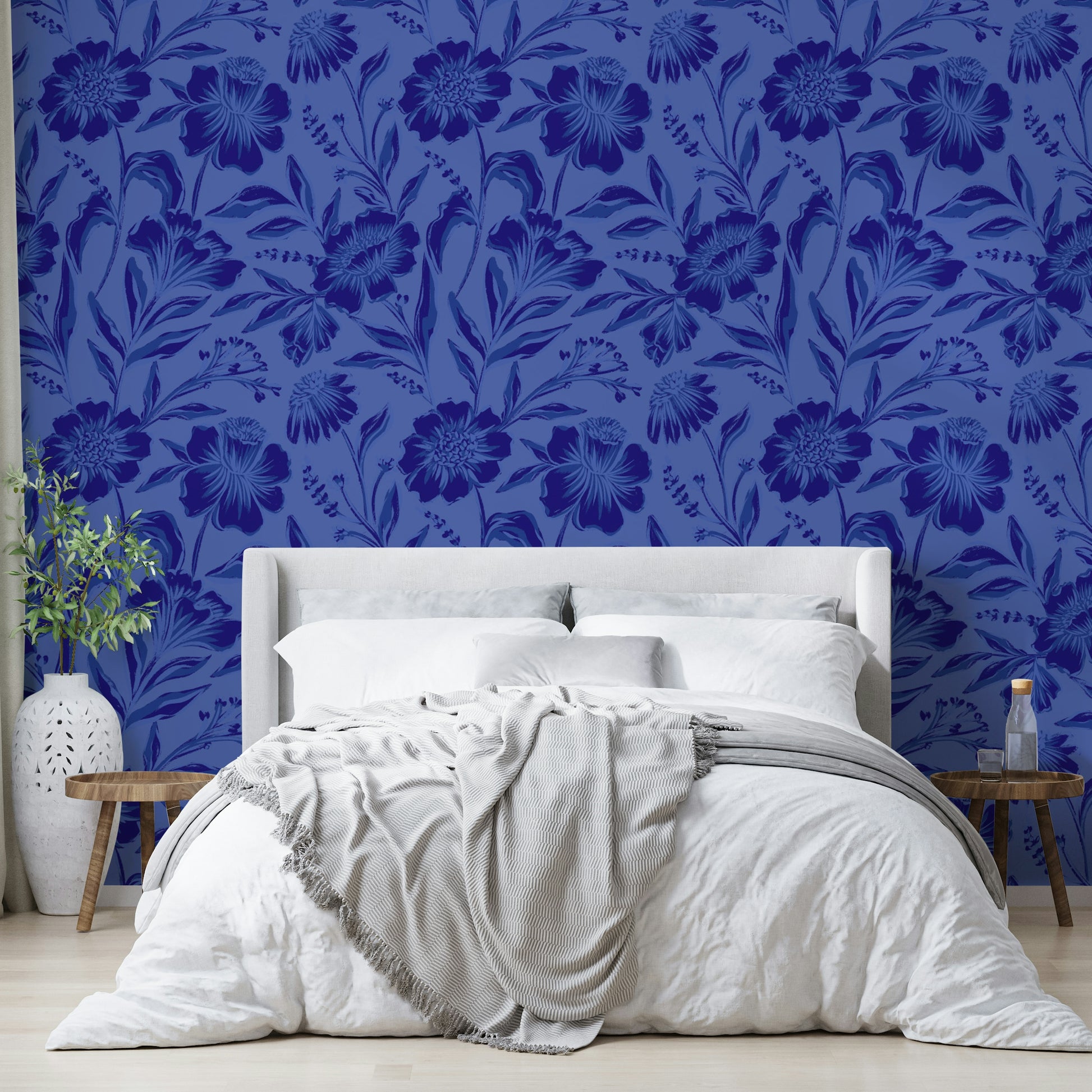 The mural is created for an entire wall, providing a sophisticated backdrop.
