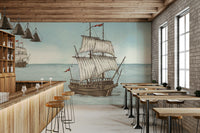 A peaceful wall mural with a natural, nautical design.


