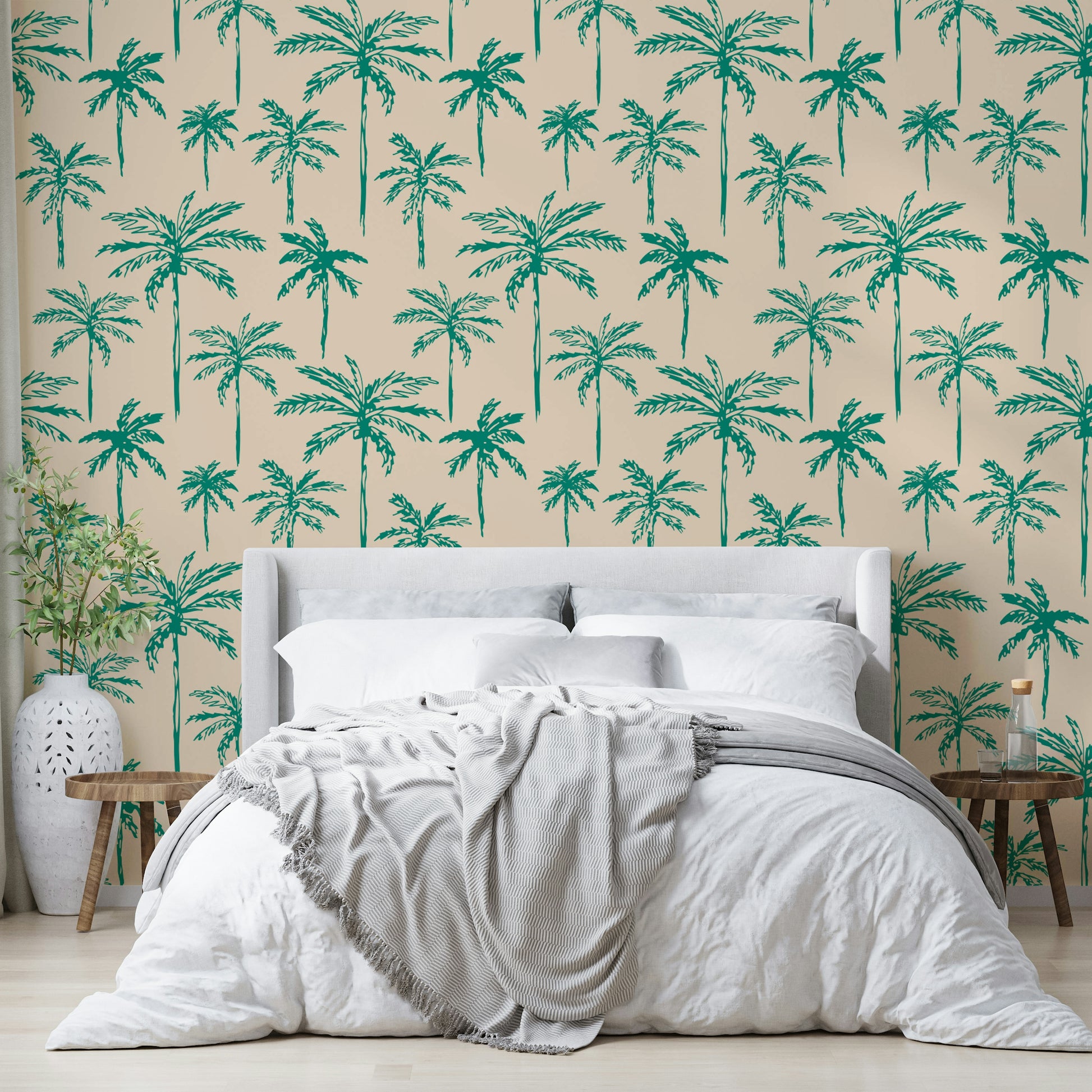 A full-wall mural showing a scene of palm trees.
