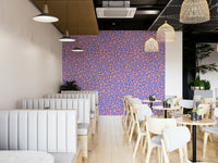 A full-wall mural showing a pattern of soft flowers.
