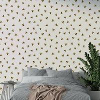 The image features stylized, whimsical bees flying around.
