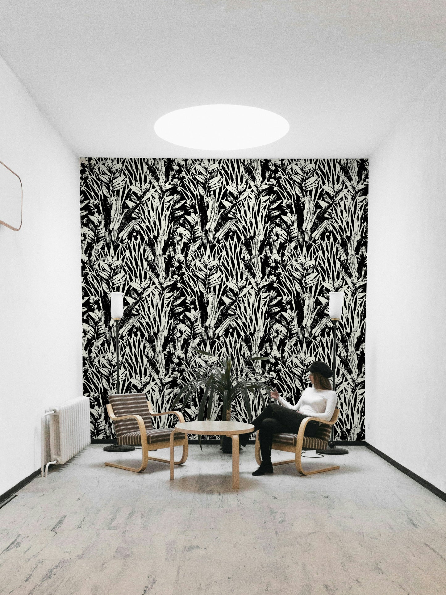 A full-wall mural showing a botanical pattern.
