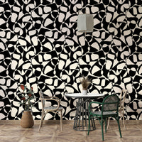 The background of the wallpaper is a light, neutral grey.
