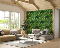 A sunroom decorated with a tropical mural

