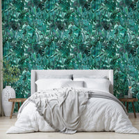 An angled shot of a wall with green wallpaper

