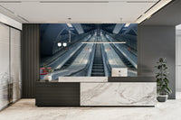 A high-angle view of the wall mural in a large space.

