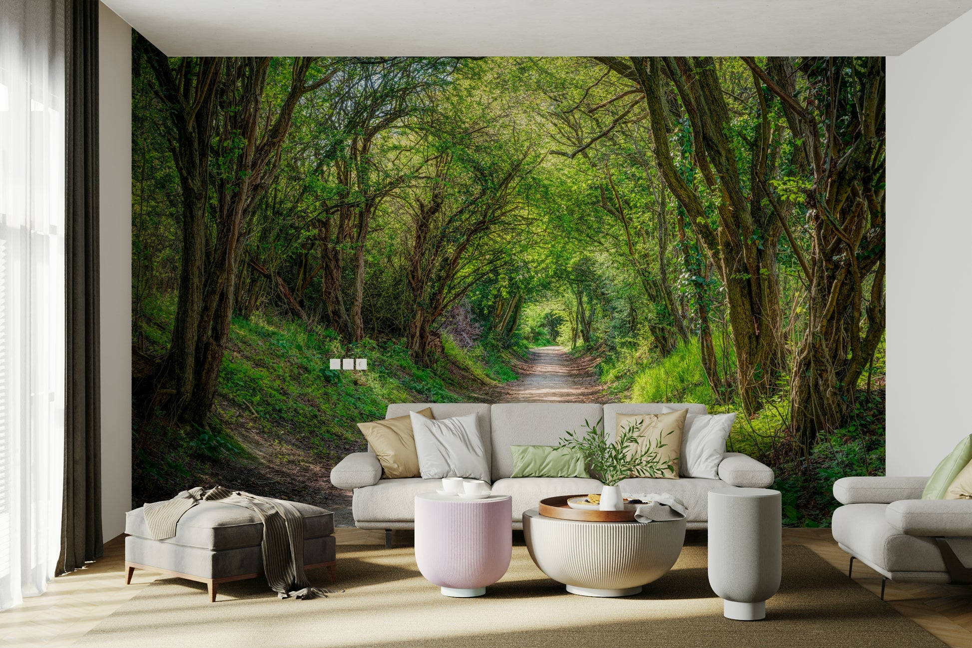 A bedroom with the forest mural behind the headboard.


