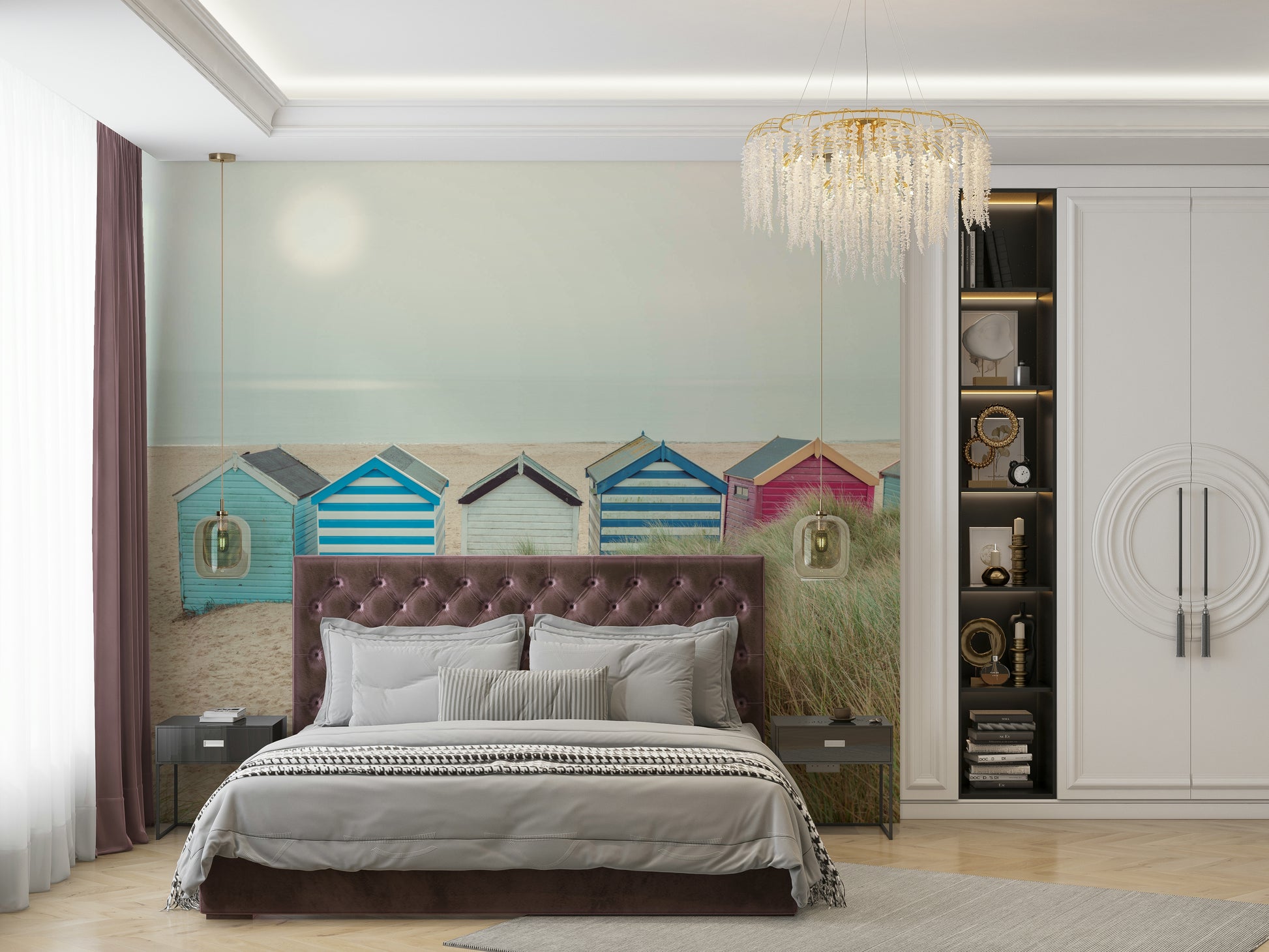 A beautiful row of colorful beach huts on a sandy beach under a blue sky.

